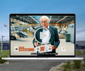 Martin Vestergaard, founder of Power Stow, presenting in a video shown on a laptop screen inside the company’s production facility